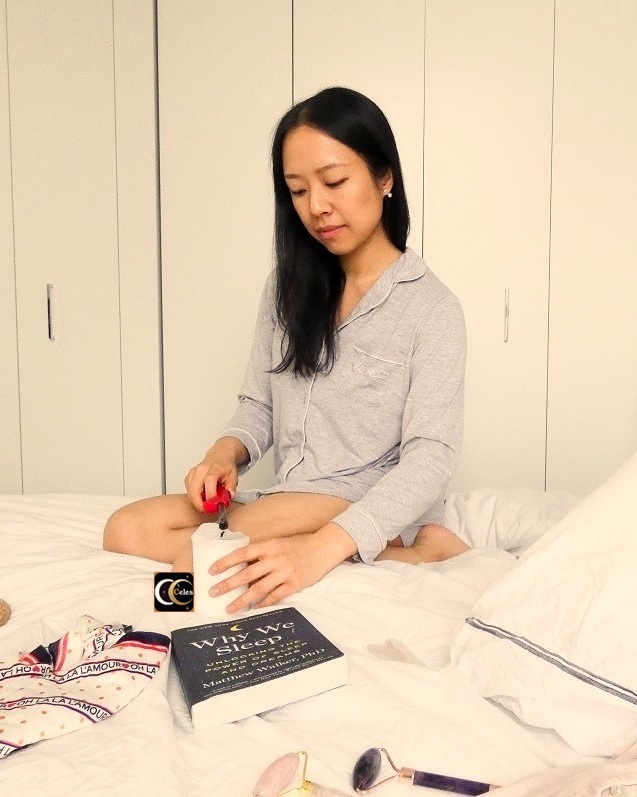 Celes circle app founder Valina woman long hair self-care holding manifestation candle