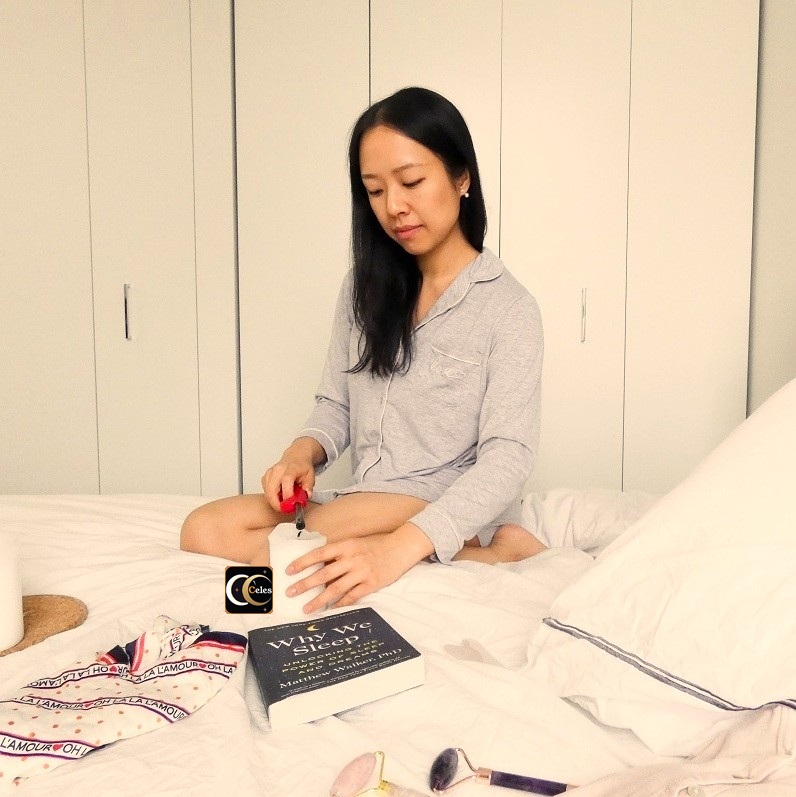 Celes circle app founder Valine woman long hair self-care holding manifestation candle