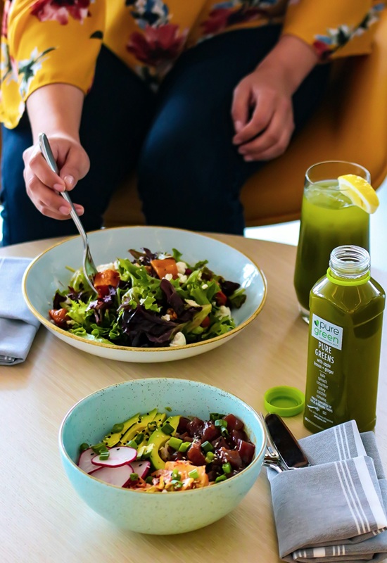Colorful healthy salads and green smoothies